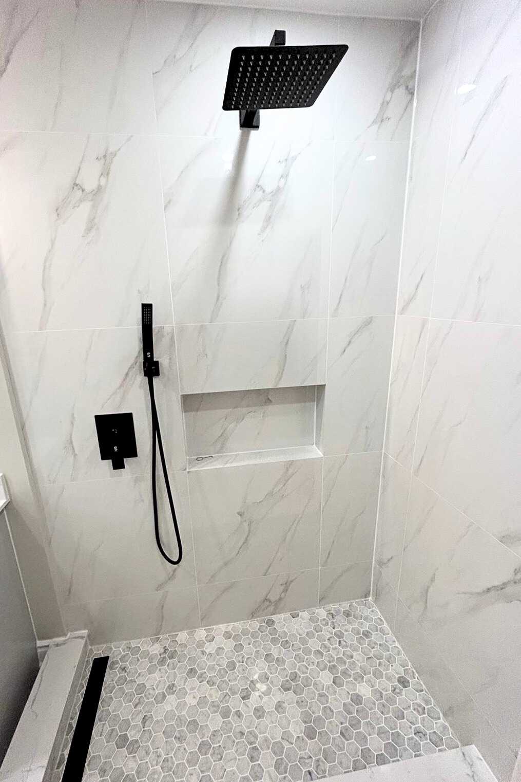 Walkin shower, overhead shower faucet, rounded mirror