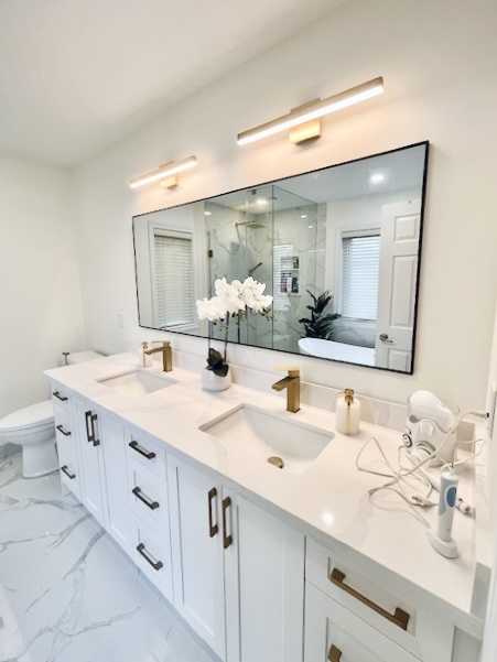 Green tone custom vanity with brushed gold fixture, 24"*24"grey porcelain