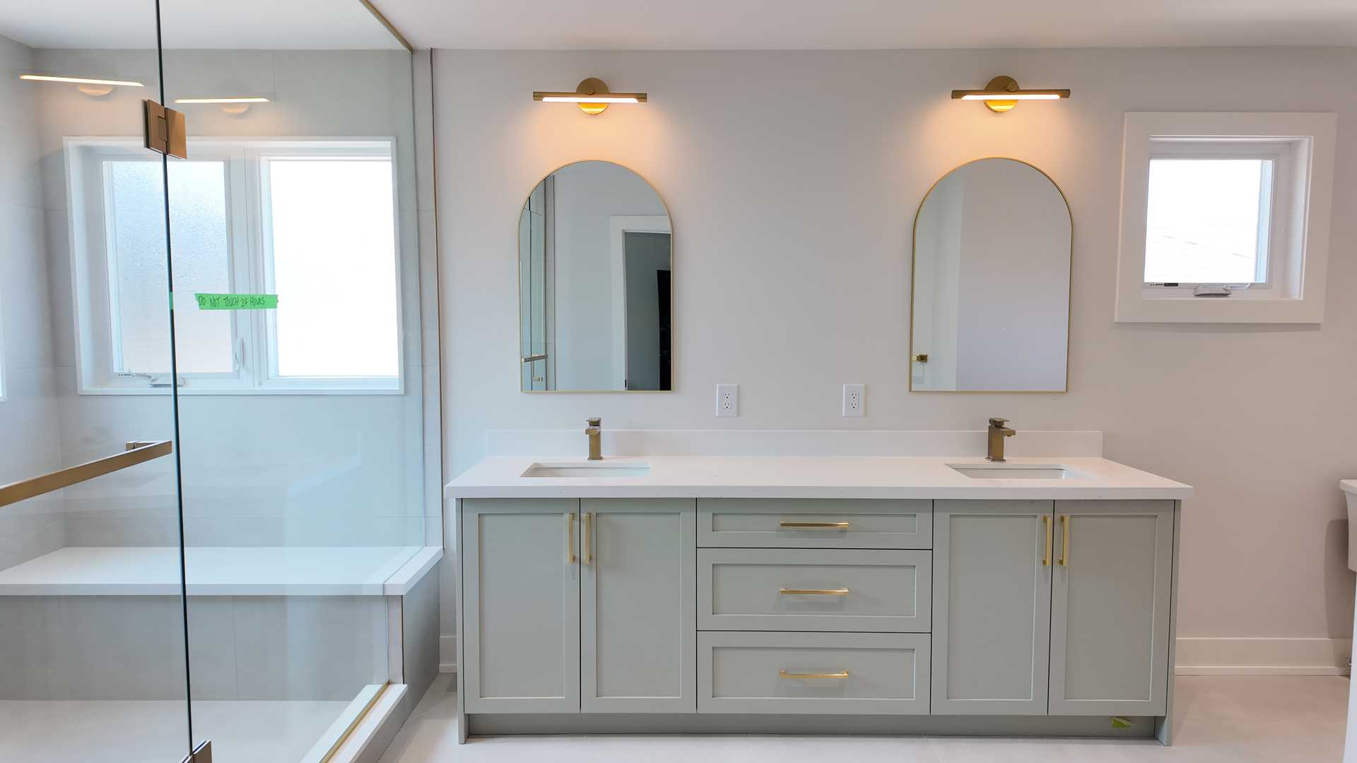 4 bathroom-fluted custom black vanity for share bathroom, avocado green