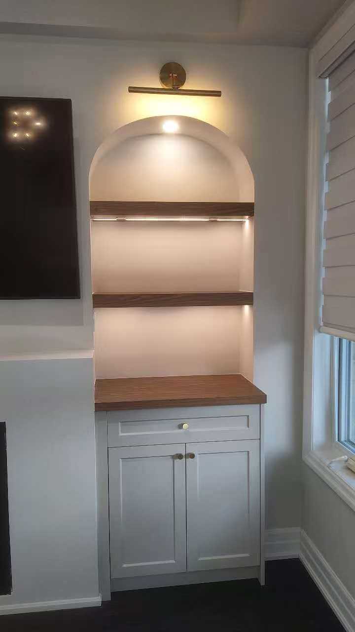 arch fireplace wall unit with shelf and underlight, gold fixture