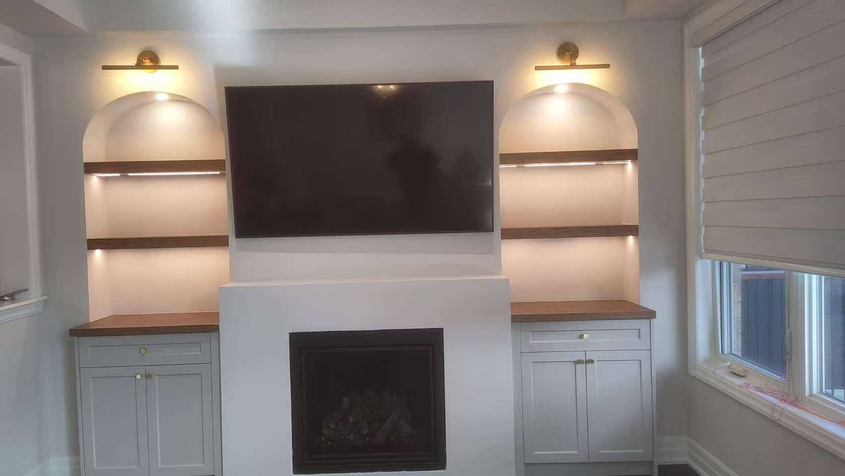 arch fireplace wall unit with shelf and underlight, gold fixture
