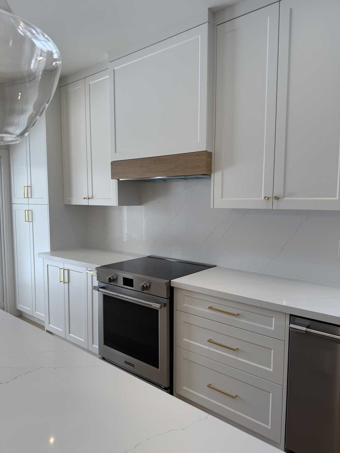 MDF snow white kitchen with wooden island, built in undermount