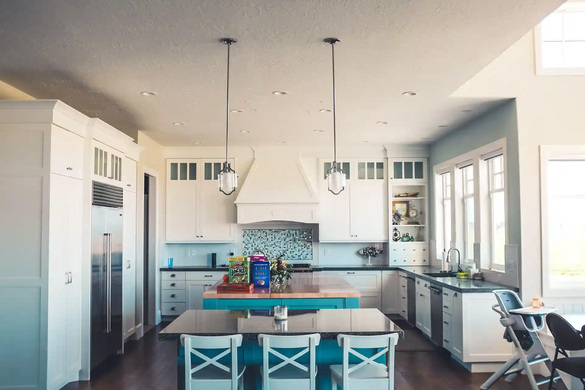 Scarborough kitchen lighting plan with recessed lights and pendants above the island